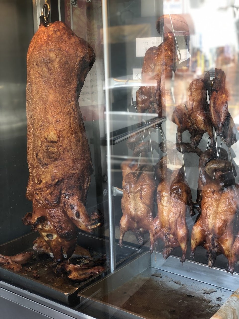 Restaurant menu with Chinese dishes and categories.