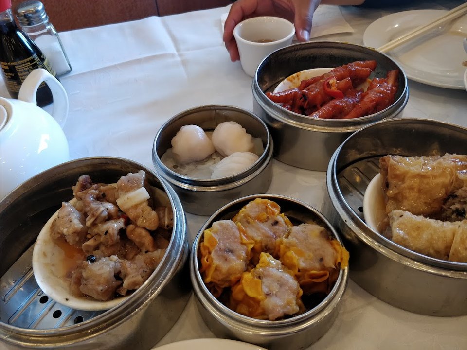 Restaurant menu with Chinese dishes and categories.